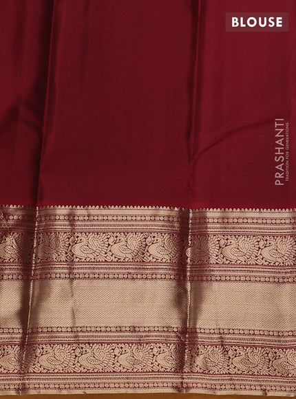 Pure kanchipuram silk saree peacock blue and maroon with allover zari rudraksha buttas and long zari woven border