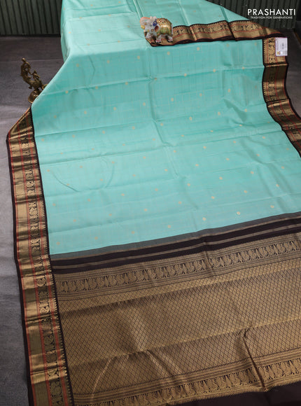 Pure kanchipuram silk saree teal blue and coffee brown with allover zari checks & buttas and zari woven korvai border