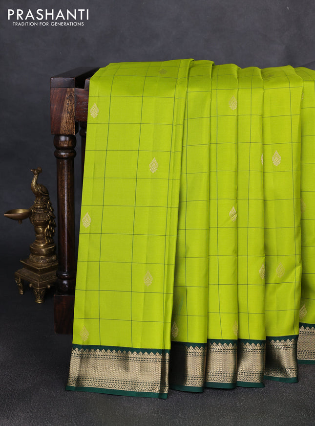 Pure kanchipuram silk saree light green and bottle green with allover checks & zari woven buttas and zari woven korvai border
