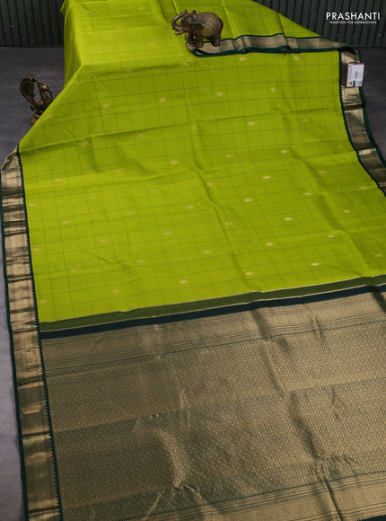 Pure kanchipuram silk saree light green and bottle green with allover checks & zari woven buttas and zari woven korvai border