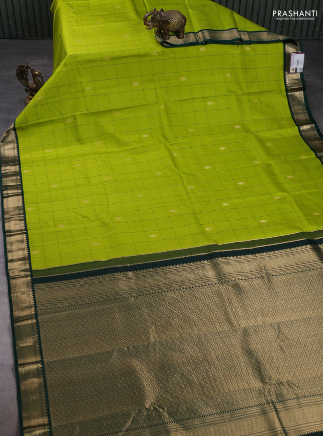 Pure kanchipuram silk saree light green and bottle green with allover checks & zari woven buttas and zari woven korvai border