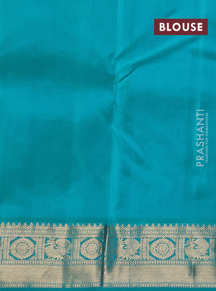 Pure kanchipuram silk saree peach orange and teal blue with allover zari checks & buttas and zari woven korvai border