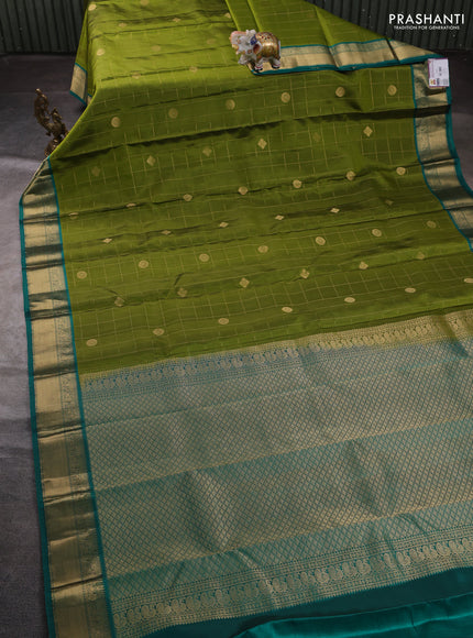 Pure kanchipuram silk saree light green and green with allover zari checks & buttas and zari woven korvai border