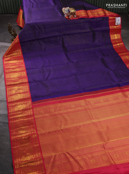 Pure kanchipuram silk saree blue and peach pink with allover zari checks & buttas and long zari woven korvai border