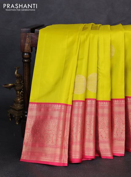 Pure kanchipuram silk saree lime yellow and peach pink with allover rudraksha zari woven buttas and long zari woven border