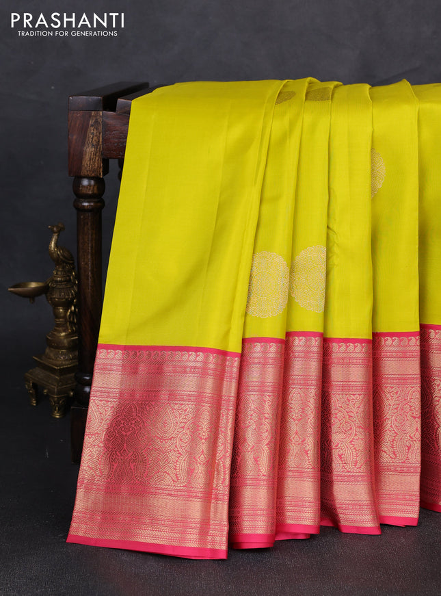 Pure kanchipuram silk saree lime yellow and peach pink with allover rudraksha zari woven buttas and long zari woven border