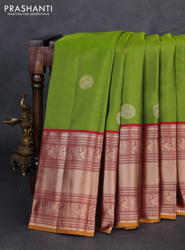 Pure kanchipuram silk saree light green and maroon with zari woven buttas and long zari woven border