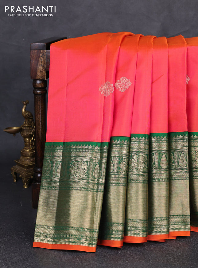 Pure kanchipuram silk saree dual shade of pinkish orange and green with zari woven buttas and long rich zari woven border