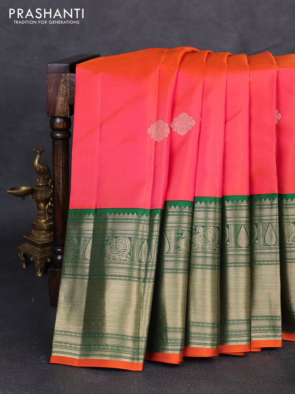 Pure kanchipuram silk saree dual shade of pinkish orange and green with zari woven buttas and long rich zari woven border