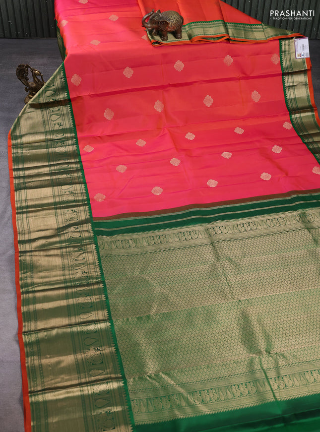 Pure kanchipuram silk saree dual shade of pinkish orange and green with zari woven buttas and long rich zari woven border