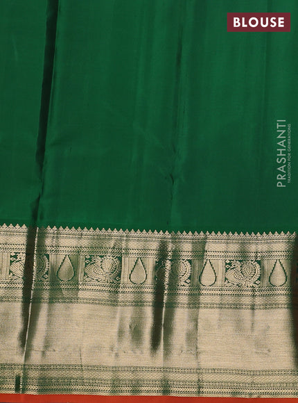 Pure kanchipuram silk saree dual shade of pinkish orange and green with zari woven buttas and long rich zari woven border
