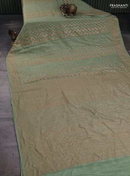 Banarasi crepe saree pista green with allover thread & zari zigzag weaves and woven border