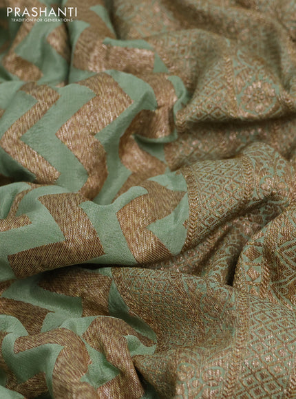 Banarasi crepe saree pista green with allover thread & zari zigzag weaves and woven border