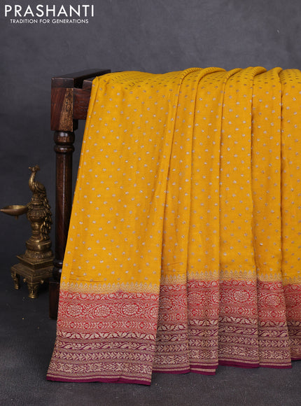 Banarasi crepe saree mustard yellow and purple with allover thread & zari woven buttas and woven border