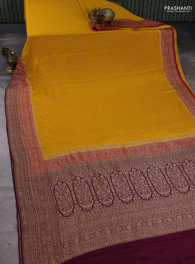 Banarasi crepe saree mustard yellow and purple with allover thread & zari woven buttas and woven border