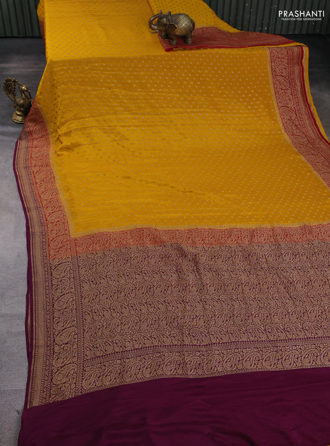 Banarasi crepe saree mustard yellow and purple with allover thread & zari woven buttas and woven border