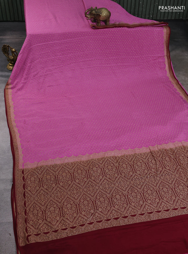 Banarasi crepe saree pink and maroon with allover thread & zari woven buttas and woven border