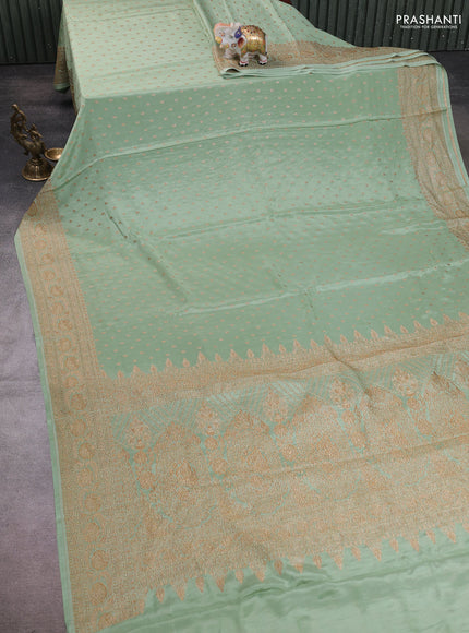 Banarasi crepe saree pastel green with allover thread & zari woven buttas and woven border