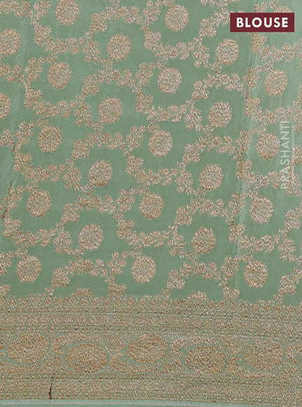 Banarasi crepe saree pastel green with allover thread & zari woven buttas and woven border