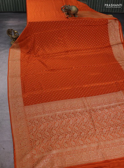 Banarasi crepe saree orange with allover thread & zari woven buttas and woven border