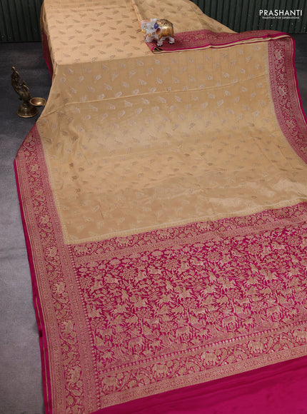 Banarasi crepe saree sandal and pink with allover thread & zari woven buttas and woven border