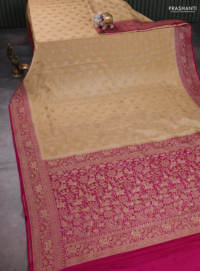 Banarasi crepe saree sandal and pink with allover thread & zari woven buttas and woven border