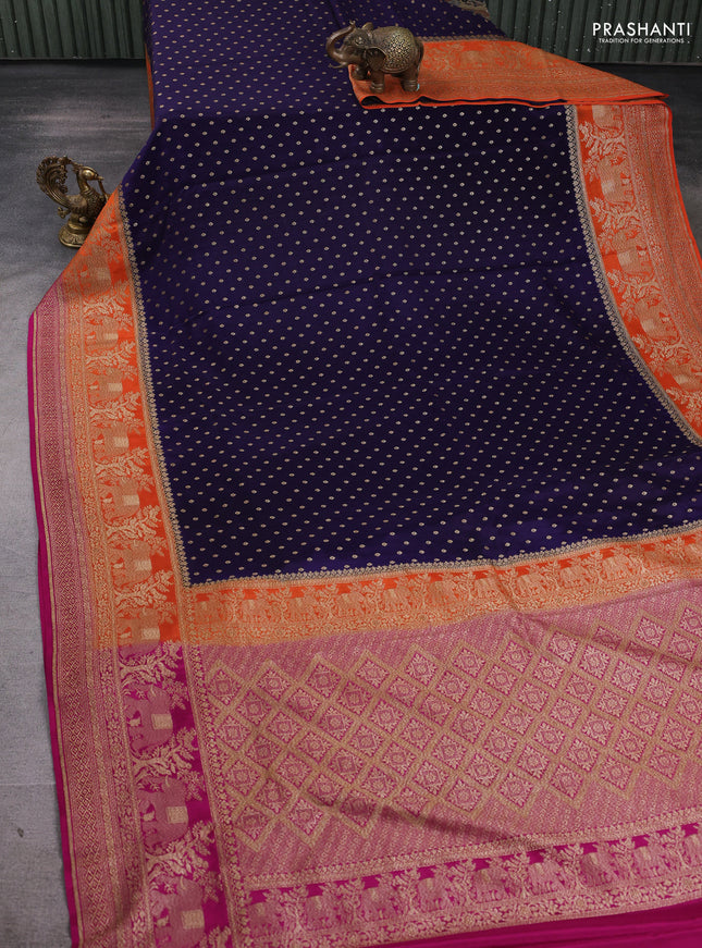 Banarasi crepe saree navy blue and orange & pink with allover thread & zari woven buttas and long woven border