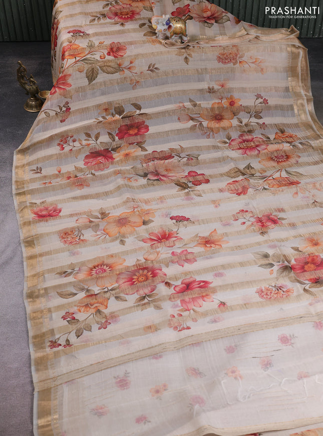 Organza tissue tussar silk saree sandal with allover zari stripe pattern & floral prints and zari woven border
