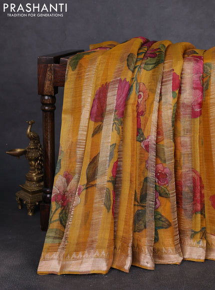 Organza tissue tussar silk saree mustard yellow with allover zari stripe pattern & floral prints and zari woven border