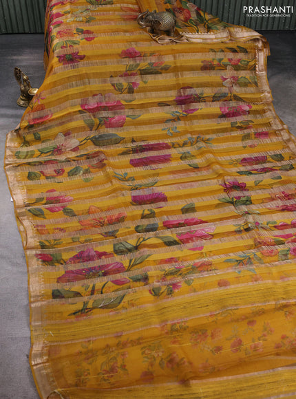 Organza tissue tussar silk saree mustard yellow with allover zari stripe pattern & floral prints and zari woven border