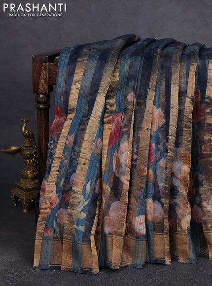 Organza tissue tussar silk saree peacock blue with allover zari stripe pattern & floral prints and zari woven border