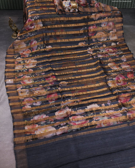 Organza tissue tussar silk saree black with allover zari stripe pattern & floral prints and zari woven border
