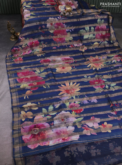 Organza tissue tussar silk saree peacock blue with allover zari stripe pattern & floral prints and zari woven border