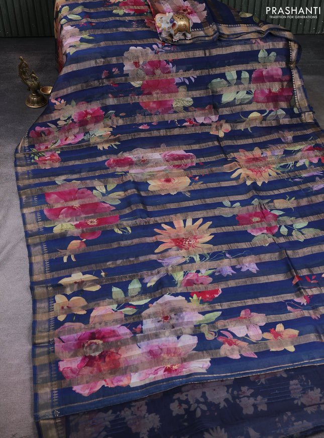 Organza tissue tussar silk saree peacock blue with allover zari stripe pattern & floral prints and zari woven border