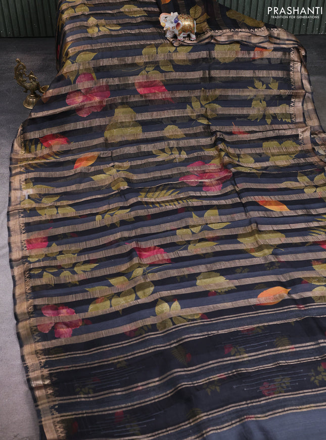 Organza tissue tussar silk saree black with allover zari stripe pattern & leaf prints and zari woven border