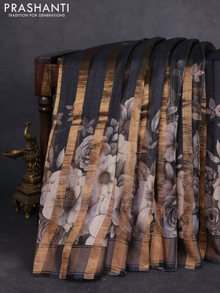 Organza tissue tussar silk saree black with allover zari stripe pattern & floral prints and zari woven border