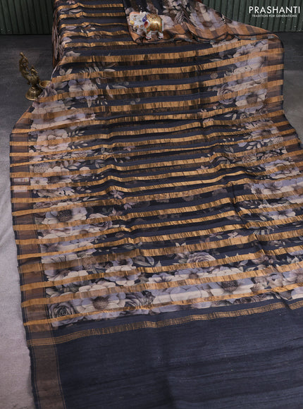 Organza tissue tussar silk saree black with allover zari stripe pattern & floral prints and zari woven border