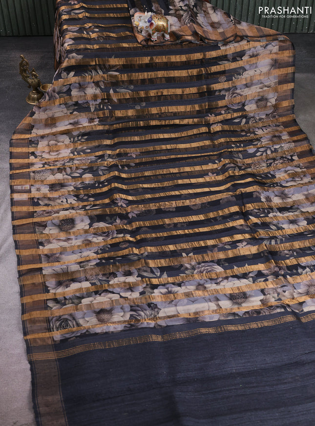 Organza tissue tussar silk saree black with allover zari stripe pattern & floral prints and zari woven border