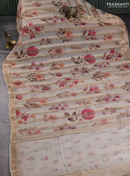 Organza tissue tussar silk saree cream with allover zari stripe pattern & floral prints and zari woven border