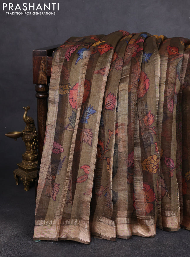 Organza tissue tussar silk saree dark olive green with allover zari stripe pattern & kalamkari prints and zari woven border