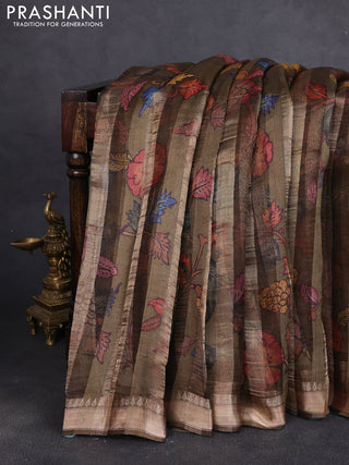 Organza tissue tussar silk saree dark olive green with allover zari stripe pattern & kalamkari prints and zari woven border