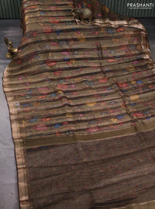 Organza tissue tussar silk saree dark olive green with allover zari stripe pattern & kalamkari prints and zari woven border