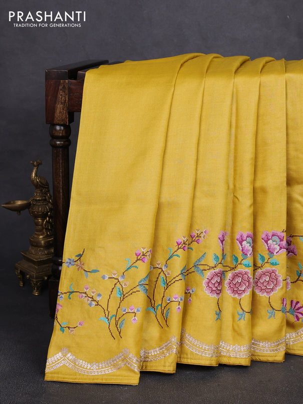Pure tussar silk saree yellow with plain body and floral embroidery border
