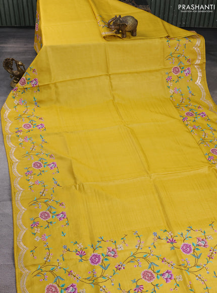 Pure tussar silk saree yellow with plain body and floral embroidery border