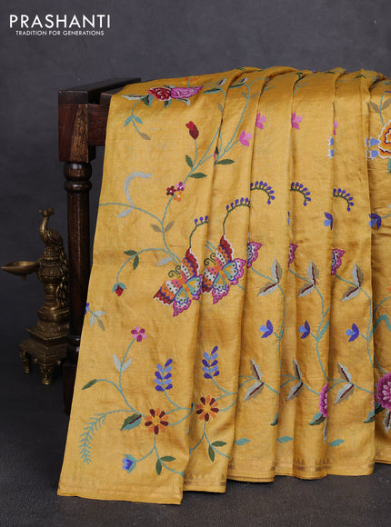 Pure tussar silk saree mustard yellow with allover embroidery work and small zari woven border