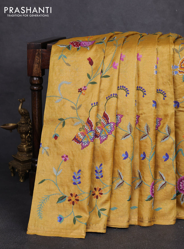 Pure tussar silk saree mustard yellow with allover embroidery work and small zari woven border