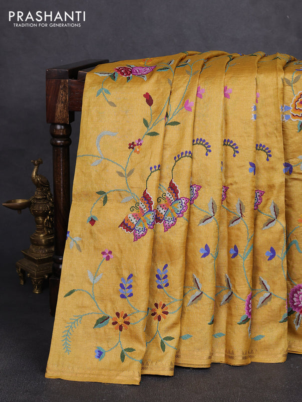 Pure tussar silk saree mustard yellow with allover embroidery work and small zari woven border