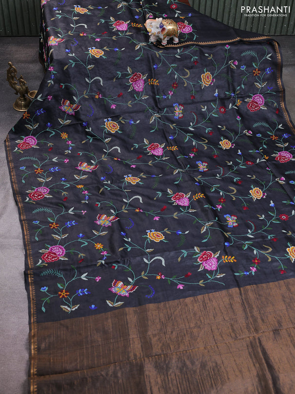 Pure tussar silk saree black with allover embroidery work and small zari woven border