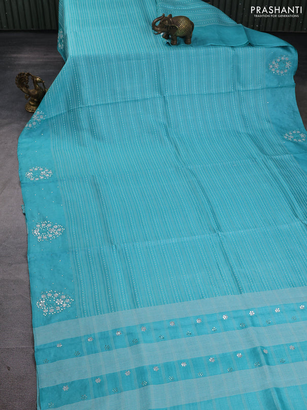 Pure tussar silk saree teal blue with allover thread weaves and mirror embroidery work border