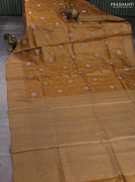 Pure tussar silk saree dark mustard with allover embroidery work and thread woven border